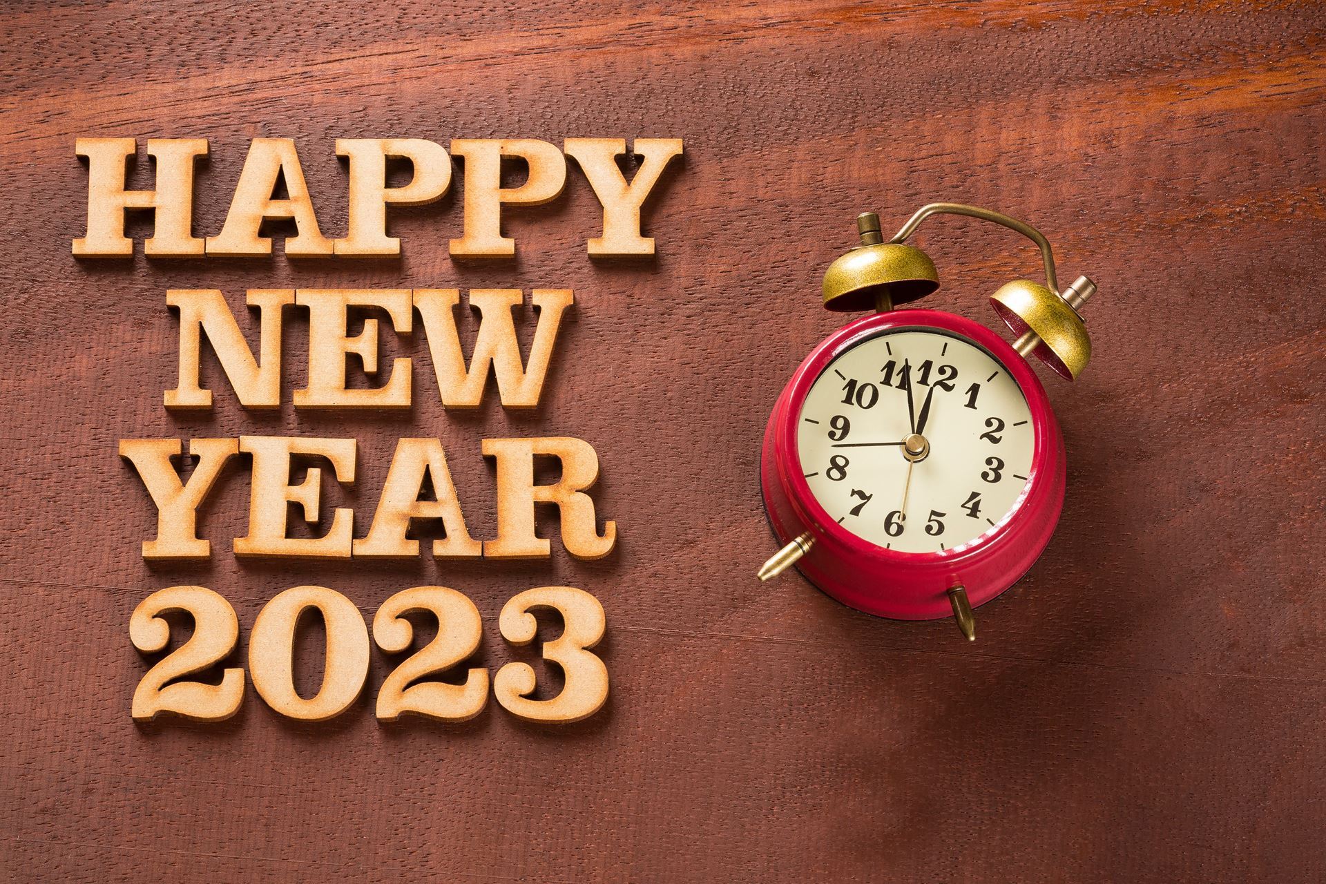 Happy New Year 2023 with an alarm clock. 